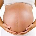 Young Pregnant Woman Isolated