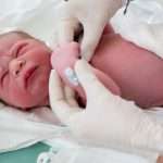 newborn-baby-been-examined-immediately-after-childbirth-picture-id836180638