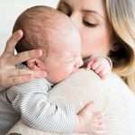 beautiful-young-mother-holding-baby-son-in-her-arms-picture-id638906320