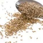 sesame-seeds-and-small-serving-spoon-picture-id172875724