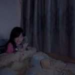 little-girl-in-bed-scared-from-a-nightmare-picture-id472860294