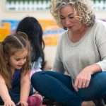 kindergarten-teacher-playing-with-student-stock-photo-picture-id1216444509