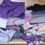 unorganized-heaps-of-clothes-of-different-colors-in-a-wardrobe-lying-picture-id1270125628